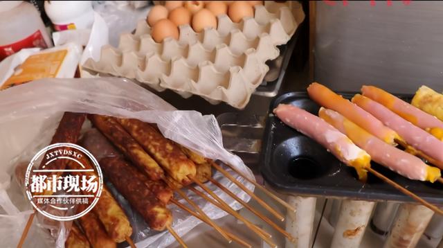 彈性蛋白酶廠家?guī)P注內蒙古食品安全火腿腸扔地上，裹上食品添加劑后，炸了賣給學生